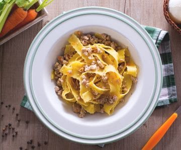 Pappardelle con ragú blanco de cinta senese